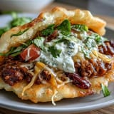 Deliciously light cloud bread tacos piled high with seasoned ground beef.