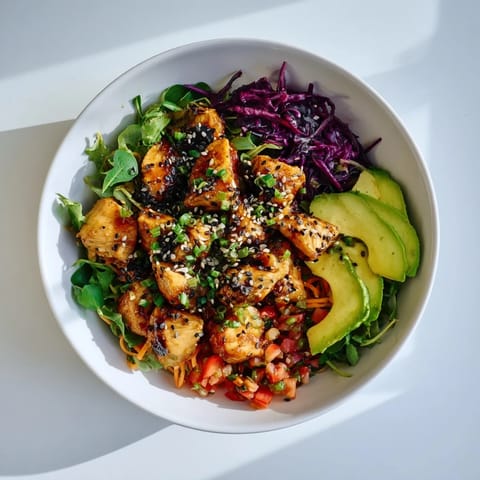 Fresh, vibrant Poppy-Inspired Chicken Salad Wraps, overflowing with juicy chicken and a tangy dressing.