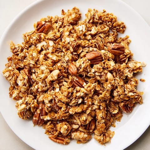 Homemade honey nut granola clusters: a close-up of the perfectly baked, sweet, delicious treat.
