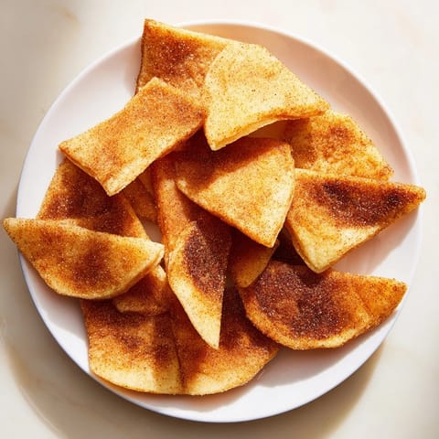 Imagine sweet, warm cinnamon sugar tortilla chips, ready to share, perfect for movie night.