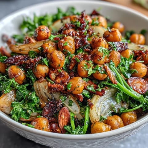 Bright and colorful chickpea and celery salad, featuring crisp veggies and a zesty Dijon vinaigrette for a refreshing meal.  